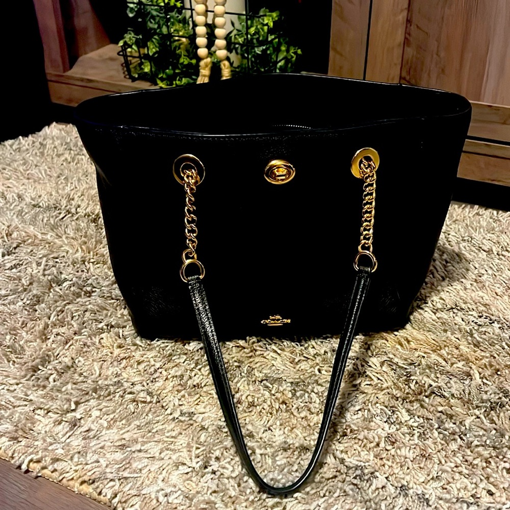 Black leather coach handbag